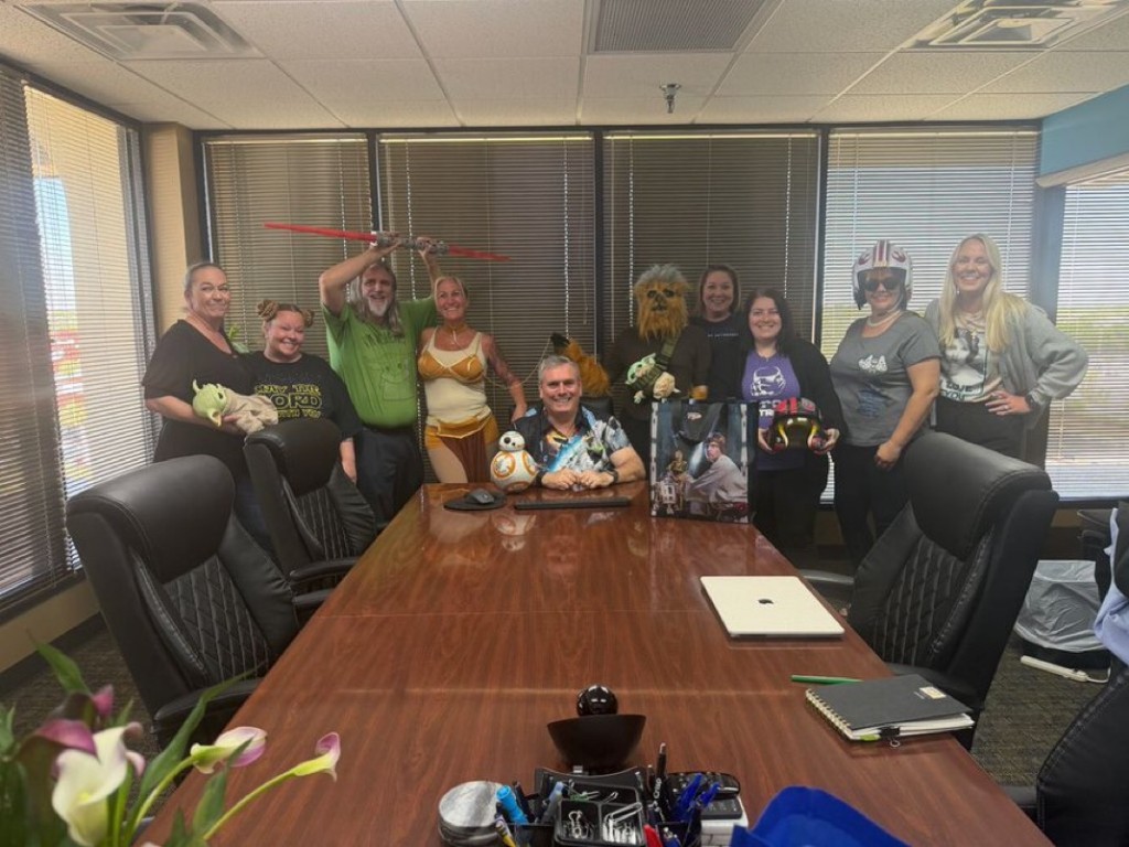 Staff group photo in conference room